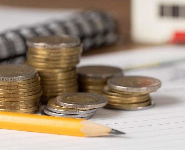 Bunch of coins on paper arrangement
